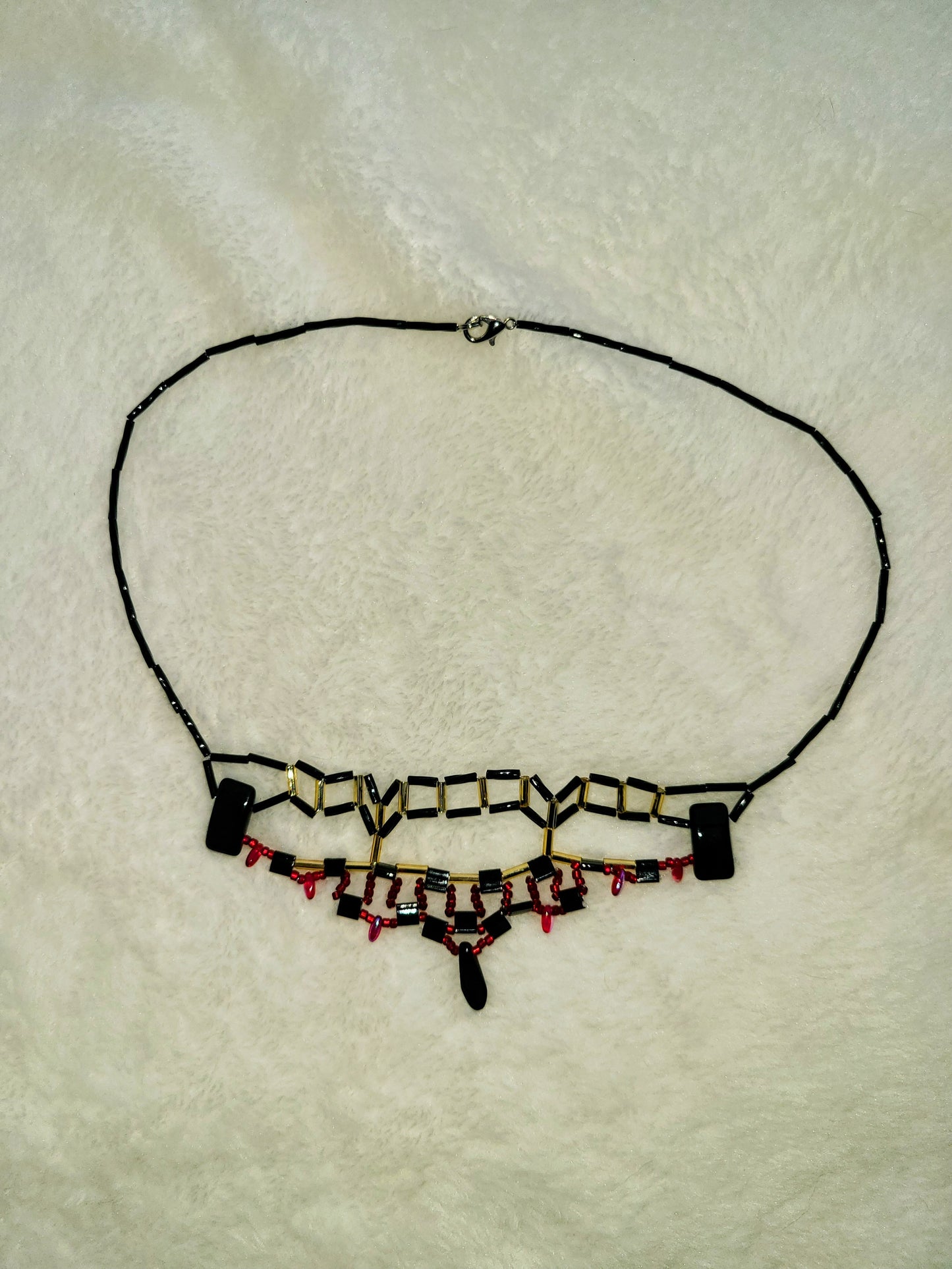 Red, black and gold skyline silhouette