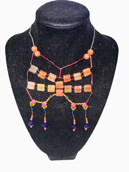 Carnelian Starlit Sands Statement necklace featuring glass beads and carnelian.