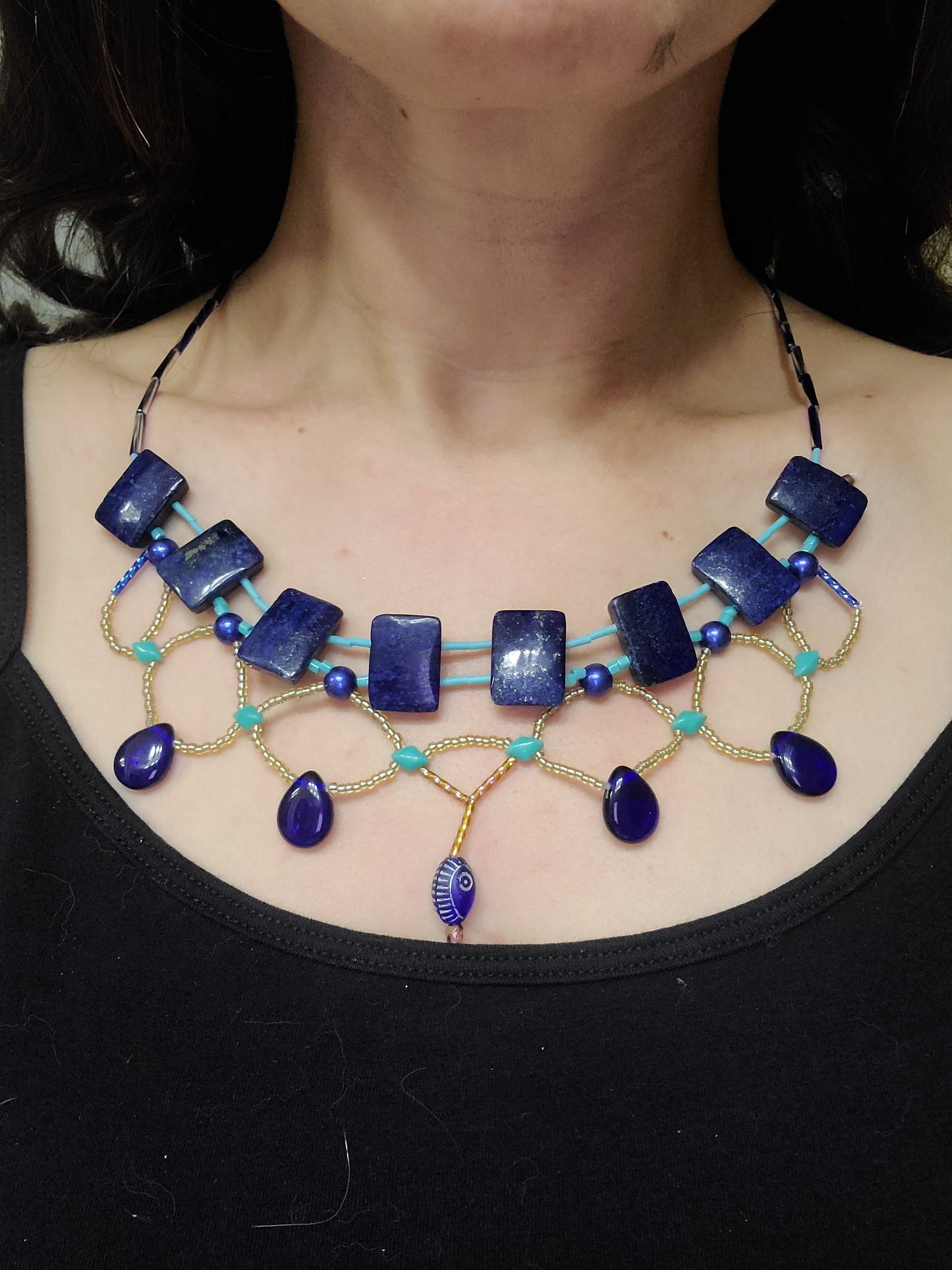 Lapis statement necklace featuring teal and cobalt glass beads.