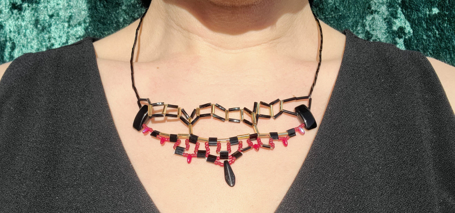 Red, black and gold skyline silhouette