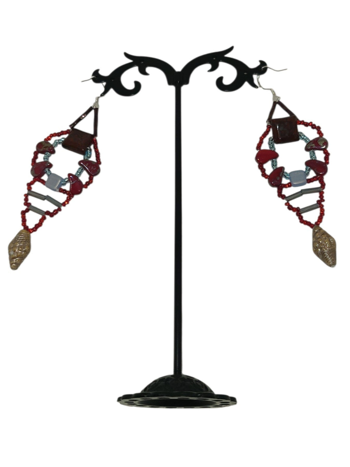 Poppy jasper beaded girandole earrings in red and icy blue diamond spindle form with whelk shell drop, front view
