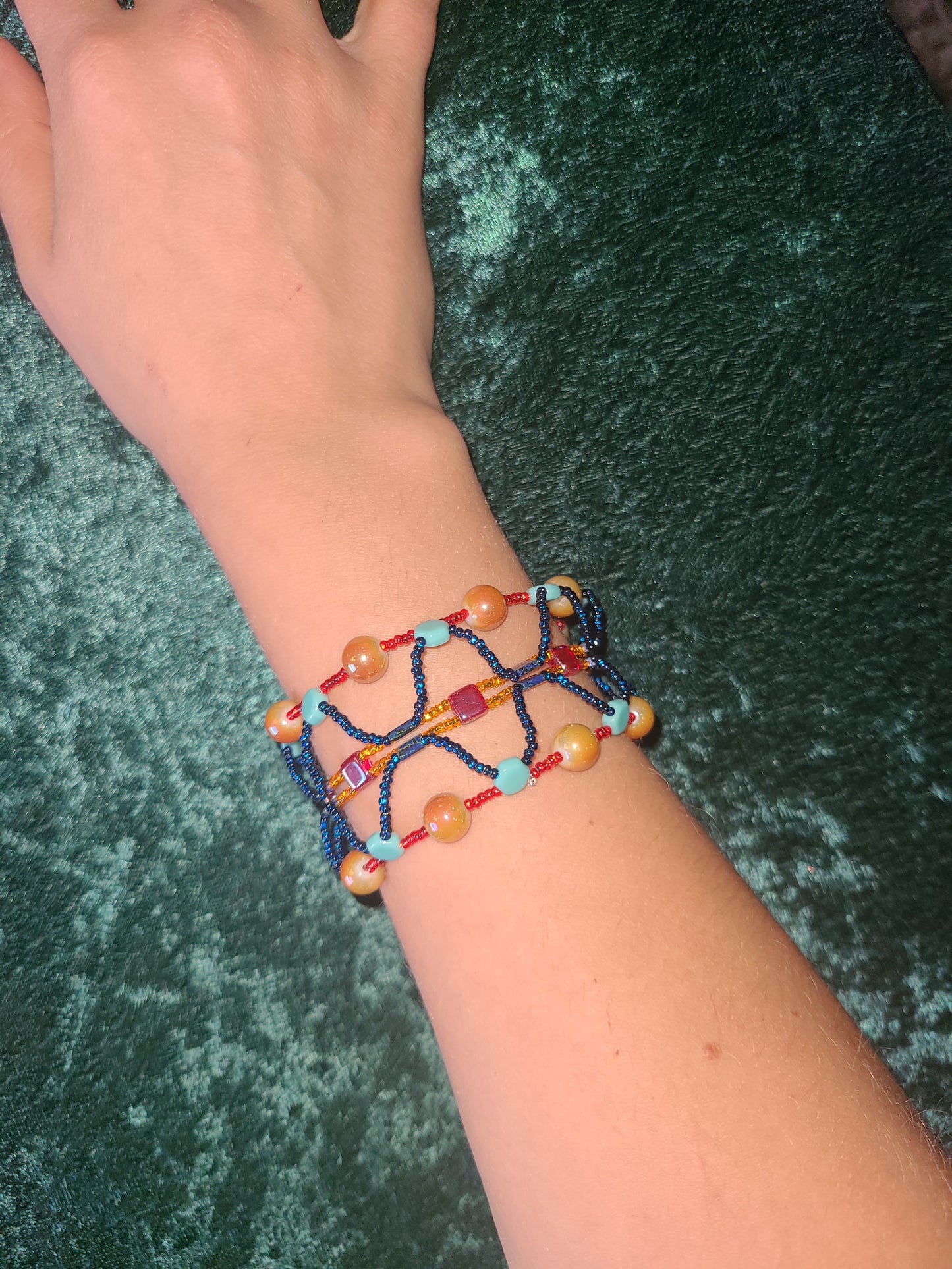 Red, orange, and teal boho mosaic bracelet