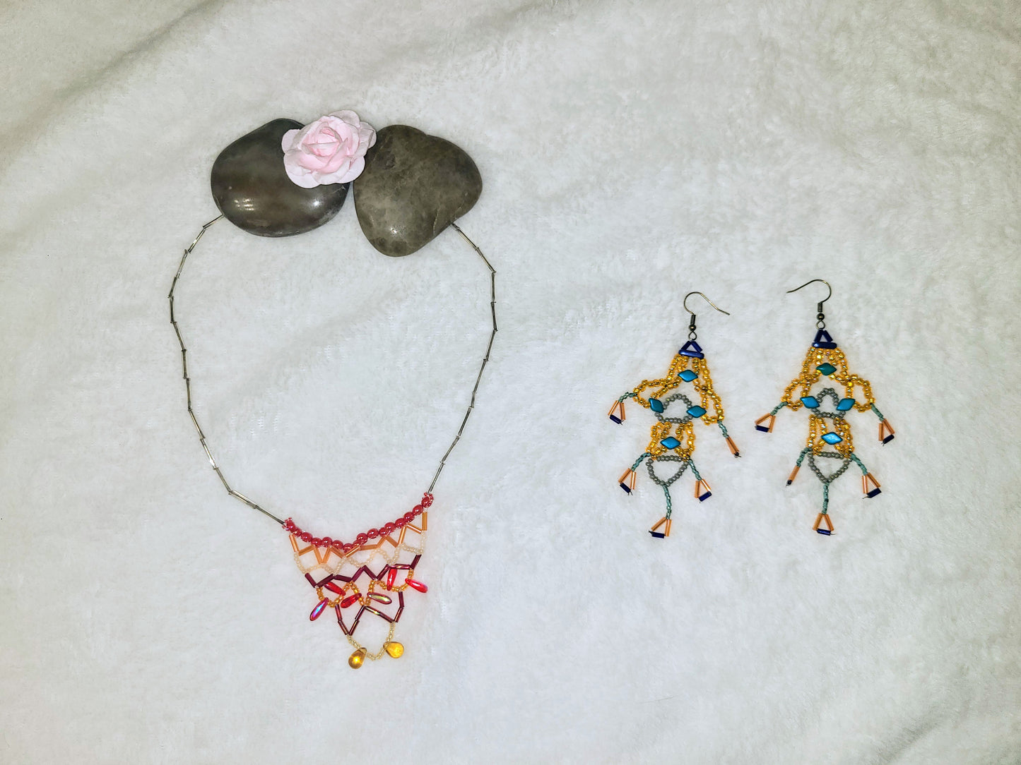 Orange geometric necklace and beaded earrings